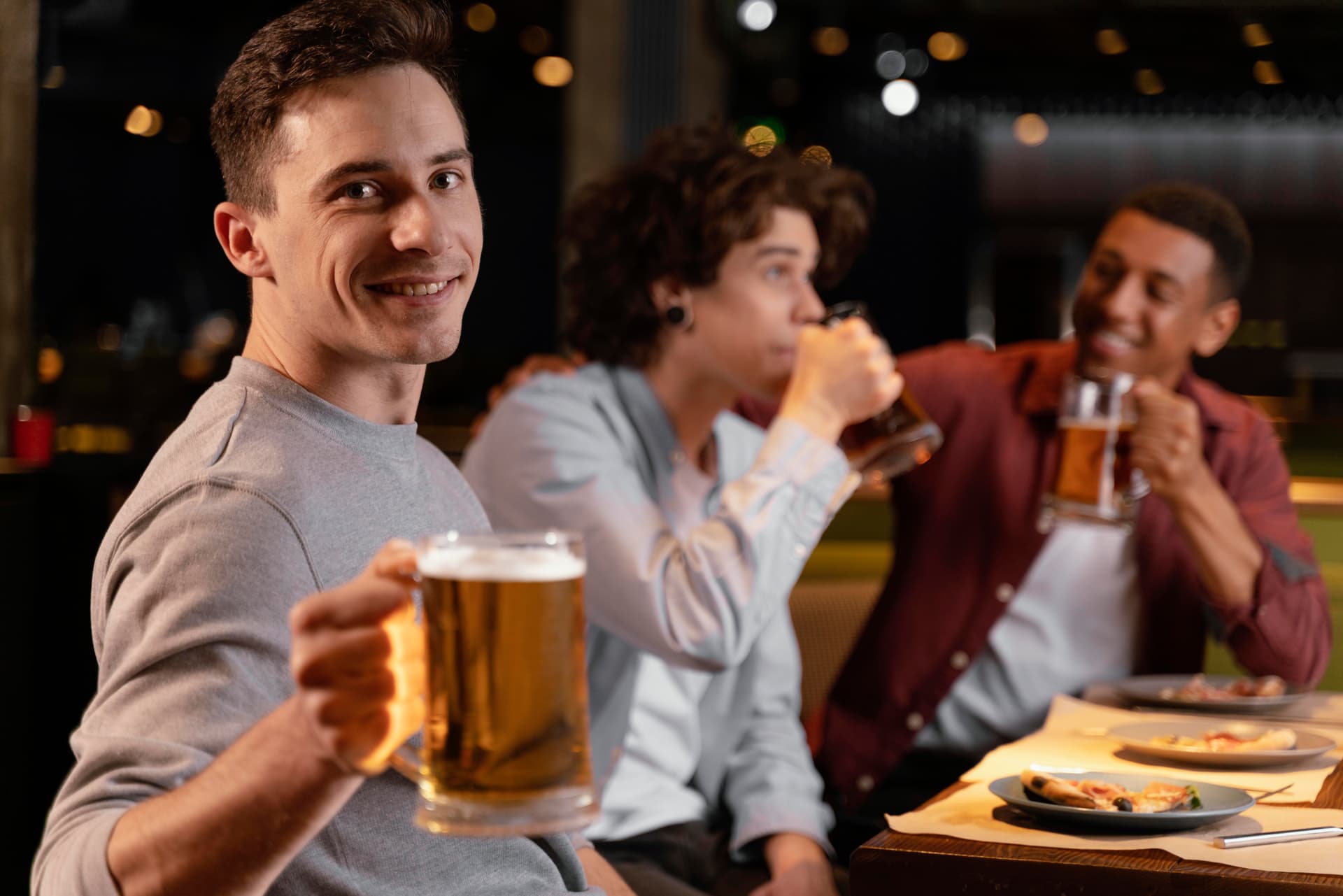 Friends enjoying a cold pint